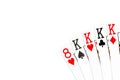 Poker hand four of a kind in kings with 8 of hearts as kicker