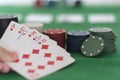 Poker player holding winning poker hand, royal flush Royalty Free Stock Photo