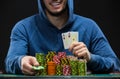 Poker player showing a pair of aces. Closeup Royalty Free Stock Photo