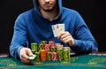Poker player showing a pair of aces Royalty Free Stock Photo