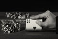 Poker player with two aces in black and white Royalty Free Stock Photo