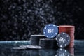 Poker playing chips on a green table and black background. Online gambling. Addiction. Casino play Royalty Free Stock Photo