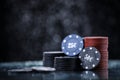 Poker playing chips on a green table and black background. Online gambling. Addiction. Casino play Royalty Free Stock Photo