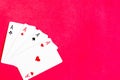 Poker quads playing card, red background Royalty Free Stock Photo