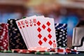 Poker royal flush with casino chips Royalty Free Stock Photo