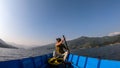 Pokhara - A man enjoying a boat tour on Phewa Lake Royalty Free Stock Photo