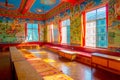 POKHARA, NEPAL - OCTOBER 06 2017: Beautiful indoor view of the hall with a painted walls inside of The Pema Ts al Sakya