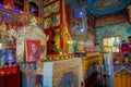 POKHARA, NEPAL - OCTOBER 06 2017: Indoor view of the sanctuary with some oblations in Thrangu Tashi Choling Monastery in