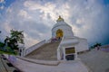 POKHARA, NEPAL, SEPTEMBER 04, 2017: Balanced on a narrow ridge high above Phewa Tal, the brilliant-white World Peace Royalty Free Stock Photo