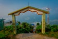 POKHARA, NEPAL, SEPTEMBER 04, 2017: Informative sign of thank you written over a pillar of a stoned gate structure at