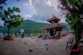 POKHARA, NEPAL - SEPTEMBER 04, 2017: Unidentified people walking around of Tal Barahi Temple, located at the center of Royalty Free Stock Photo