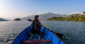 Pokhara - A woman enjoying a boat tour on Phewa Lake Royalty Free Stock Photo