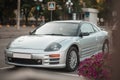 Pokrov, Ukraine - July, 23 2021: Gray Mitsubishi Eclipse sports car coupe stands parked in the city among other cars Royalty Free Stock Photo