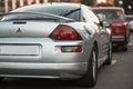 Pokrov, Ukraine - July, 23 2021: Gray Mitsubishi Eclipse sports car coupe stands parked in the city among other cars Royalty Free Stock Photo