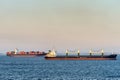 Pola Elisaveta and Newark ships race under sunset light to South Harbor, Manila, Philippines