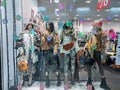 Poland, Bydgoszcz - January 13, 2022: Female mannequins demonstrate a stylish winter outerwear. Beautiful dolls in the shop window