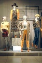 POLAND, BYDGOSZCZ - November 26, 2019: Standing women dummies show casual style collection of clothes in showcase