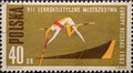 POLAND-CIRCA 1962 : A post stamp printed in Poland showing the graphic of a pole vault athlete handing over the baton at the Europ Royalty Free Stock Photo