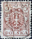 POLAND-CIRCA 1919 : A post stamp printed in Poland showing the heraldic animal of the eagle in the Coat of Arms of Poland. North P