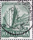 POLAND-CIRCA 1952 : A post stamp printed in Poland showing a historic shipbuilding in the dry dock. Rebuilding the Shipyard in Gda