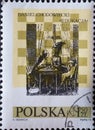 POLAND-CIRCA 1974 : A post stamp printed in Poland showing an ancient scene playing chess at the 10th International Chess Festival