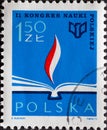 POLAND-CIRCA 1973: A post stamp printed in Poland showing a graphic flame in the book. Second Congress for Polish Science in Warsa