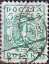 POLAND-CIRCA 1919 : A post stamp printed in Poland showing the heraldic animal of the eagle in the Coat of Arms of Poland. North P