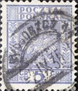 POLAND-CIRCA 1932 : A post stamp printed in Poland showing the heraldic animal of the eagle in the Coat of Arms of Poland - Vertic