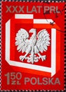 POLAND-CIRCA 1974: A post stamp printed in Poland showing the heraldic animal of the eagle of Poland. The 30th Anniversary of the