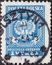 POLAND-CIRCA 1952 : A post stamp printed in Poland showing the heraldic animal of Poland the Polish Eagle