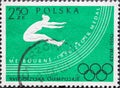 POLAND-CIRCA 1960 : A post stamp printed in Poland showing Olympic rings. Olympic Games - Rome, Italy. Long jumper