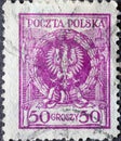 POLAND-CIRCA 1924 : A post stamp printed in Poland showing the Polish Eagle in Laurel Wreath Royalty Free Stock Photo