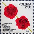 POLAND-CIRCA 1980 : A post stamp printed in Poland showing two red historical seals. The 35th Anniversary of the Friendship, Coope