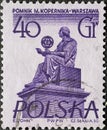 POLAND-CIRCA 1955 : A post stamp printed in Poland showing a Warsaw Statues Mikolaj Kopernik Sculpture Monument to Copernicus wit