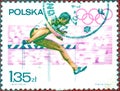 Postage stamp printed in Poland with a picture of a athlete runners, from the series `Summer Olympic Games`.