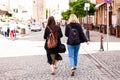 Urban life. Two young girls Walking on the Street