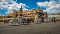 Poland - Horse carriages on the plaza - Krakow Royalty Free Stock Photo