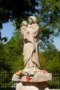 Poland - June 2018: A traditional roadside shrine among the fields, Mary Mother of God