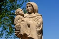 Poland - June 2018: A traditional roadside shrine among the fields, Mary Mother of God