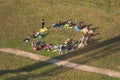 Poland Krakow July 26, 2023. Group yoga class outdoors in nature, view from above