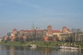 POLAND, KRAKOW - NOVEMBER 2018: Wawel Castle in the morning fog in Krakow, Poland Royalty Free Stock Photo