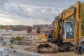 Poland Ostrowiec Swietokrzyski October 28, 2023 at 11:52. Liebherr excavator during road renovation under a cloudy sky. Royalty Free Stock Photo