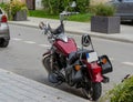 Poland Ostrowiec Swietokrzyski October 12, 2023 at 12:52. A red Kawasaki Classic motorcycle parked on the street.