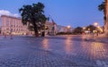 View of the Freedom Square and the city fountain at sunrise.