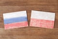 Poland and Russia flag, concept cooperation friendship on wood background. Royalty Free Stock Photo