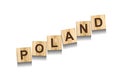 Poland, word on wooden blocks. Isolated on a white background Royalty Free Stock Photo