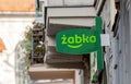 Poland, Zabka, popular Polish convenience store green signage logo sign closeup, detail, nobody, no people. Zabka shop symbol,