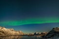 The polar arctic Northern lights hunting aurora borealis sky star in Norway travel photographer mountains. long shutter speed Royalty Free Stock Photo