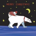 A Polar bear with a cub put on festive clothes on Christmas night Royalty Free Stock Photo