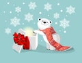 Polar bear with red scarf and gift with red bow on blue bacjground with snowflake